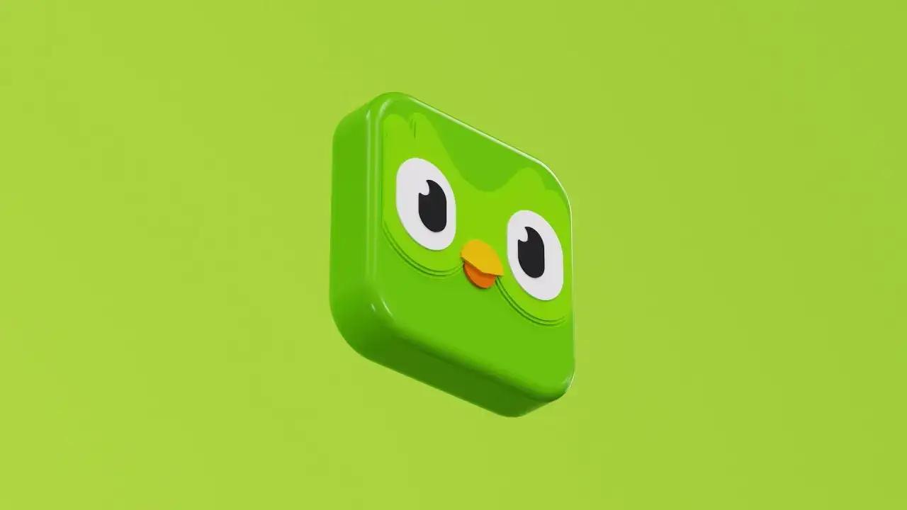 Zielona maskotka Duolingo z wielkimi oczami i dziobem. Idealna duolingo super cena dla uczących się języków.